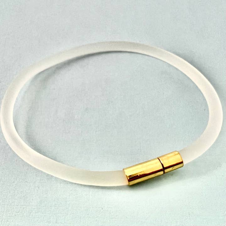 Tami Waterproof Soft-Touch Rubber Cord Bracelet with Gold Needle/Pin Clasp-Clear for wholesale by Unklaspe