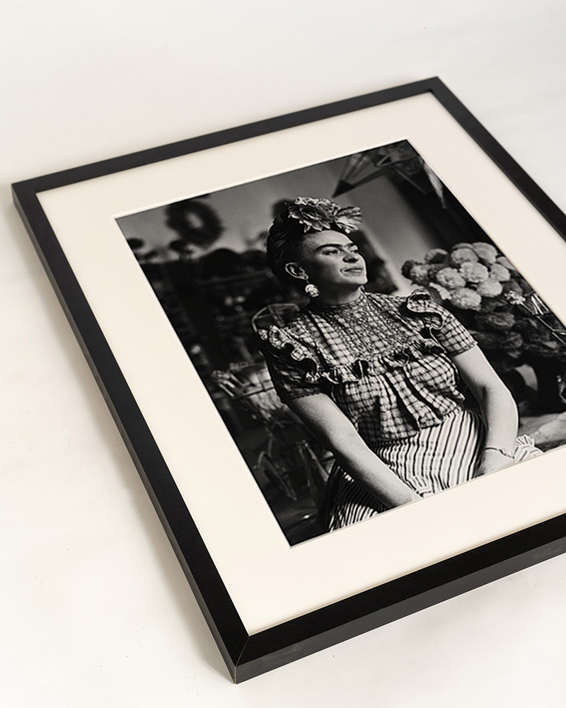 Black Thoughtful - Frida Kahlo. Wall art print with frame. for wholesale on Faire10