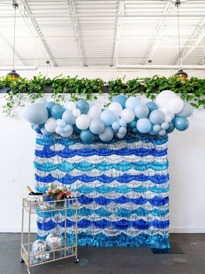 Making A Splash Fringe Backdrop for wholesale by Oh My Darling Party Co