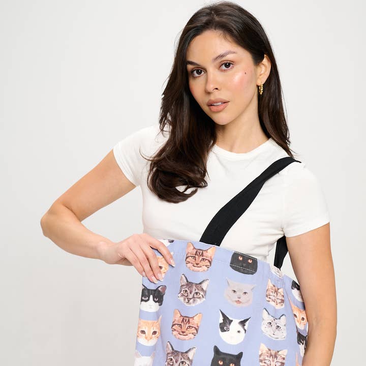 DIFFERENT CAT FACES TOTE BAG and other Purchase Wholesale sm814. Free Returns & Net 60 Terms on Faire trending on Faire.
