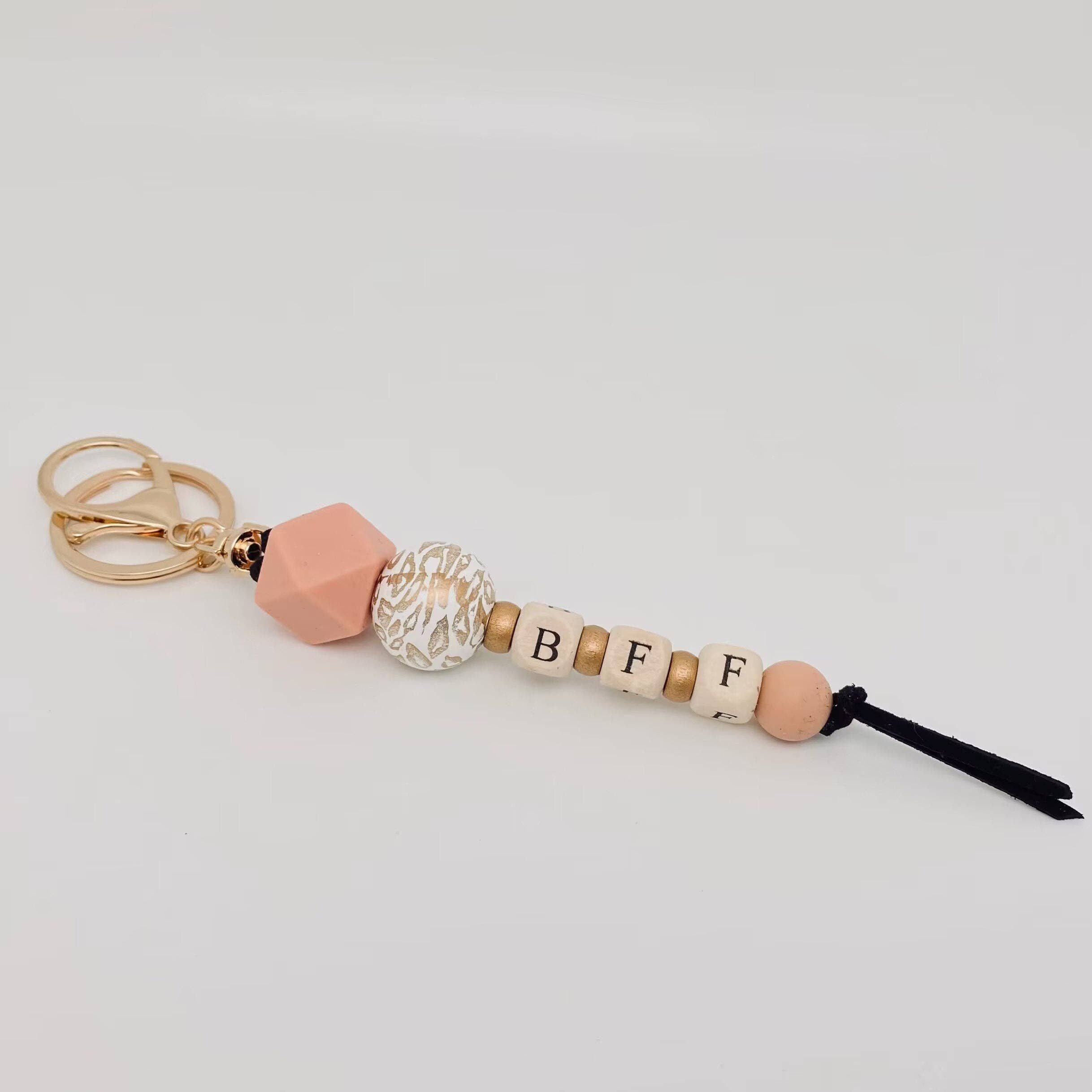 Mio Queena – wholesale Nyckelringar - Dam – Bohemisk stil silikon trä pärlstav nyckelring | Prydnad1