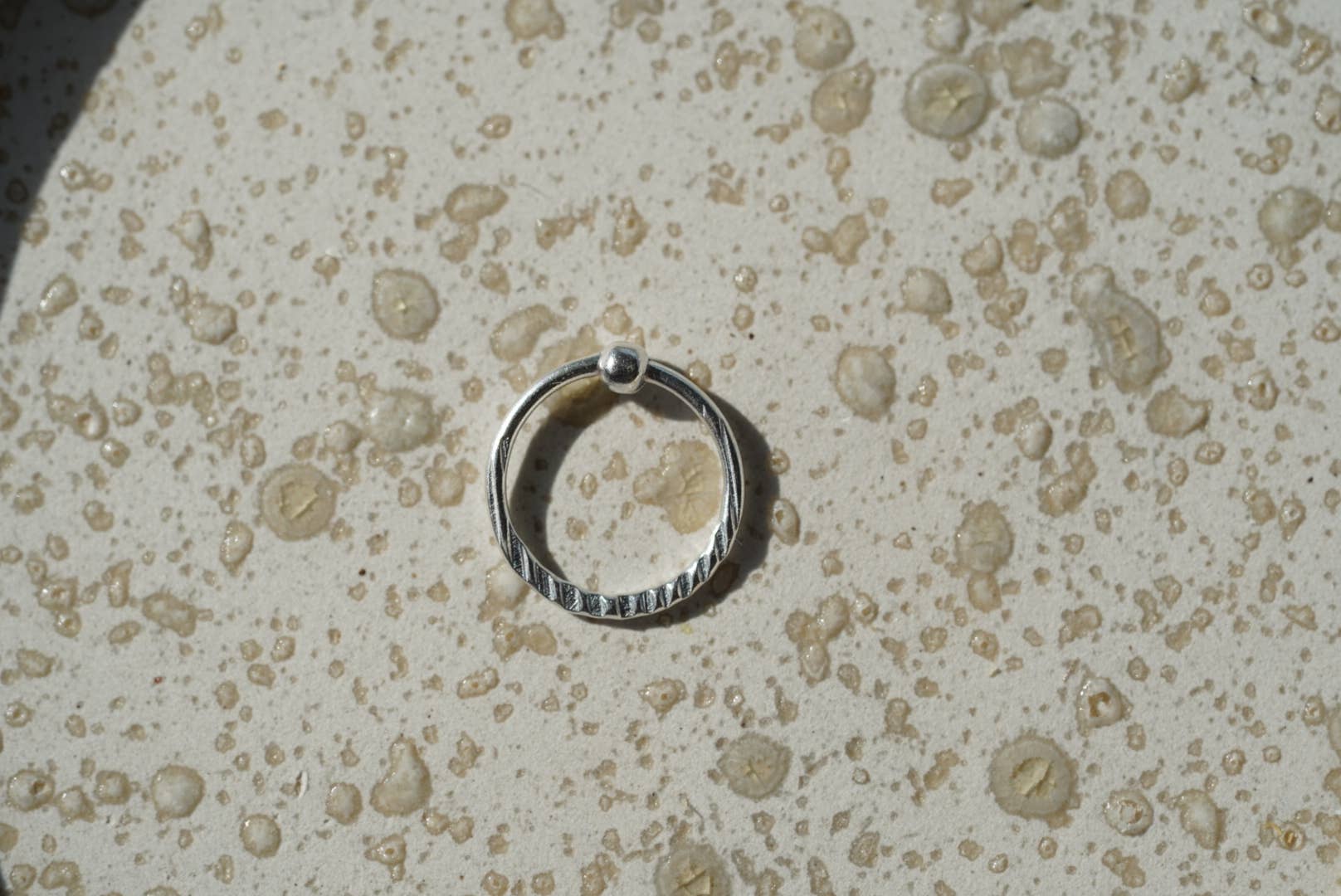 Silver Nose Ring with Hammered Cut for wholesale on Faire1