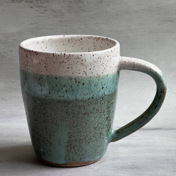 Two toned Speckled Mug in Turquoise and white for wholesale by JeLO Designs Pottery