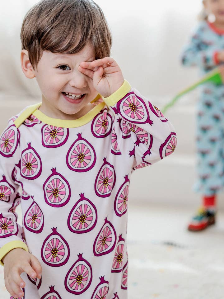 Riley Romper i økologisk bomuld - Granatæble for engroshandel hos Ameelo