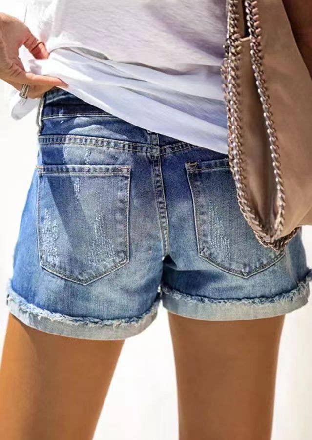 Patch Léopard Short en jean pour femme avec empiècement léopard et ourlet effiloché en vente sur Faire1