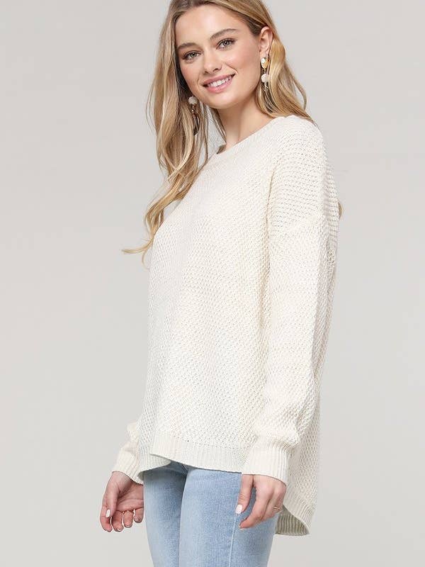 OUT80585 Top en tricot uni à col rond et ourlet mi-long pour la vente par Oceanus Apparel