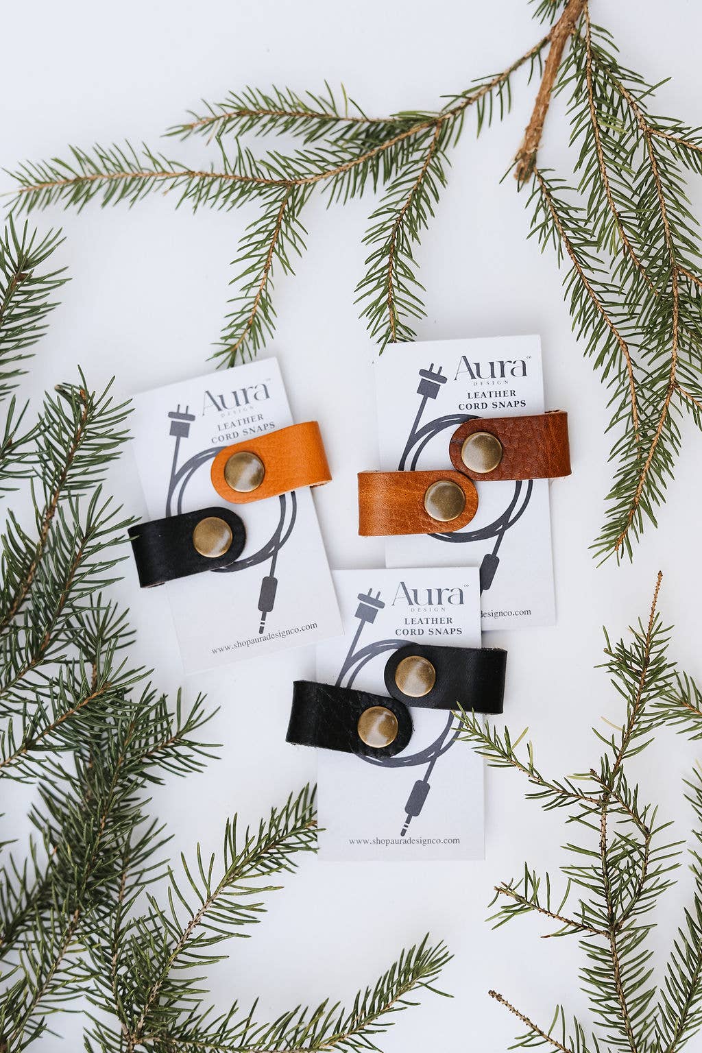 Aura Design Co. - Vendita all'ingrosso Supporti per cavi - Bottoni a pressione in pelle0