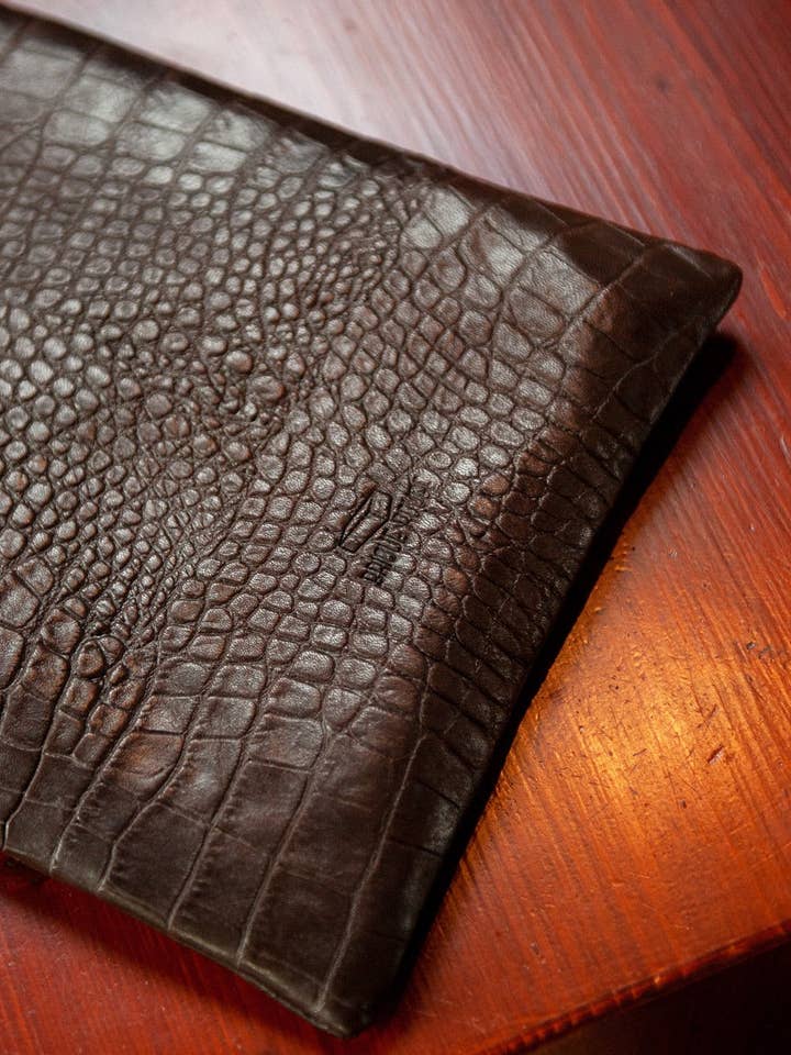 Custodia per computer portatile in pelle nera a bolle per la vendita all'ingrosso da parte di brique rouge