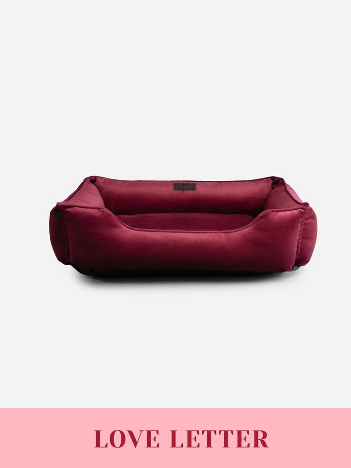 Vibrant Velvet Sleeper Dog Bed Wine for wholesale by Chester & Lee