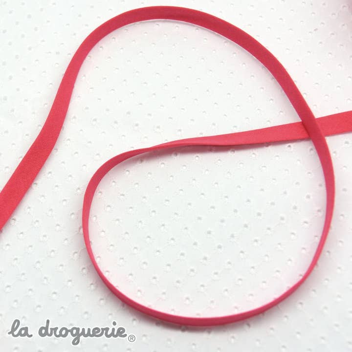 Plain cotton bias - Shocking pink - folded width 10 mm for wholesale by LA DROGUERIE