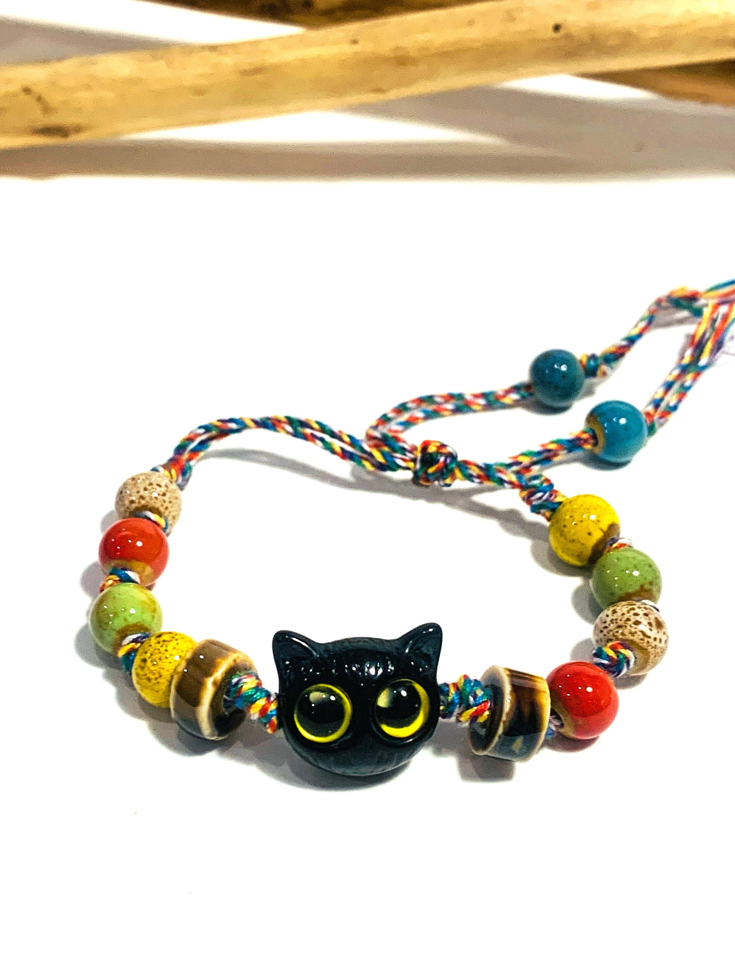 Atisha Spiritual Shop – wholesale Beaded bracelet – KITTEN ~ bracelet with kitten, black Tibetan cord, and natural hard stone beads1