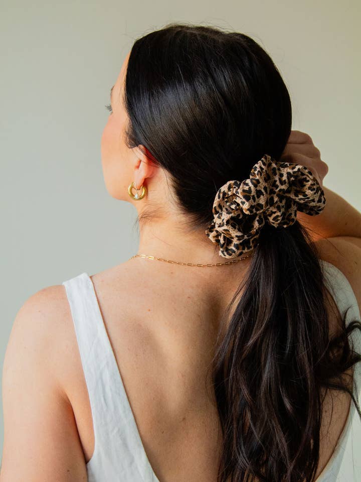 Spotted Cheetah Jumbo Scrunchie and other Purchase Wholesale cheetah set. Free Returns & Net 60 Terms on Faire trending on Faire.