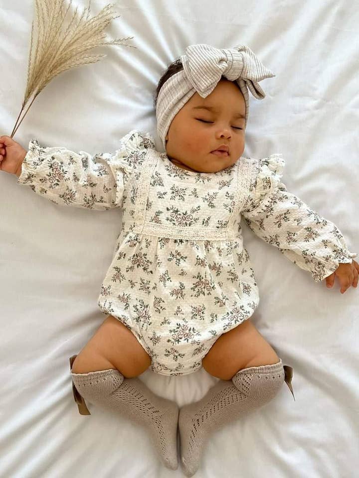 Flora Romper €13,90 (da taglia 0-3 m) per la vendita all'ingrosso da parte di Nunubebe
