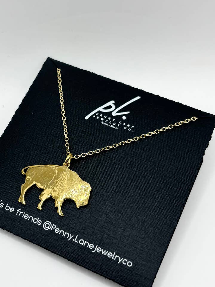 Wynonna gold buffalo wilderness necklace for wholesale by Penny Lane Jewelry Co