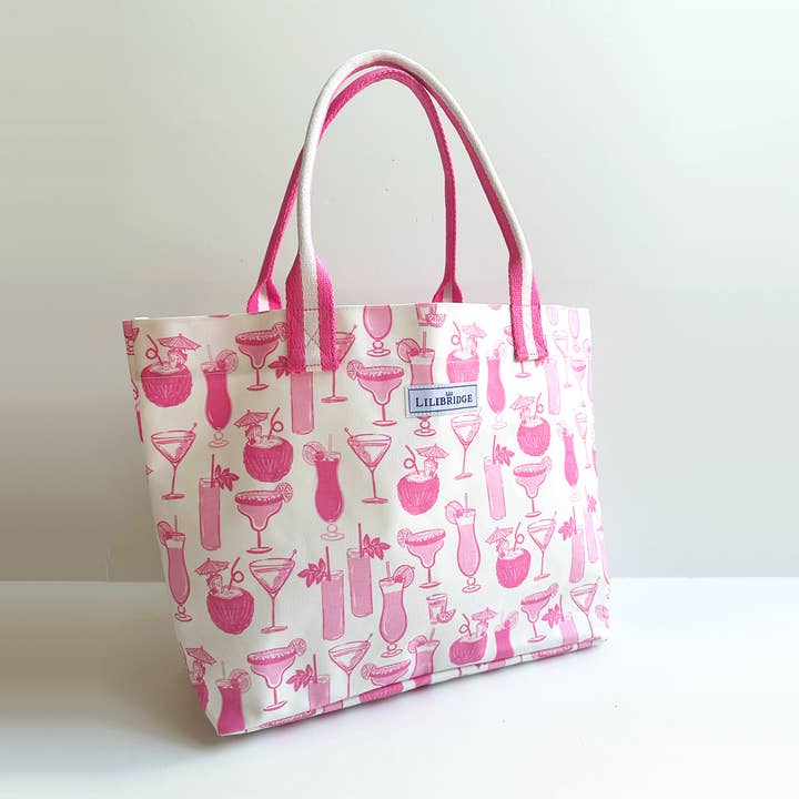 Le sac fourre-tout Live and Love, Cocktails roses, Toile enduite pour la vente par Lilibridge