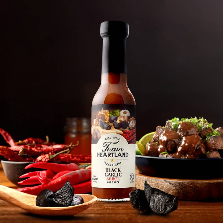 Black Garlic Arbol Hot Sauce for wholesale by Texan Heartland