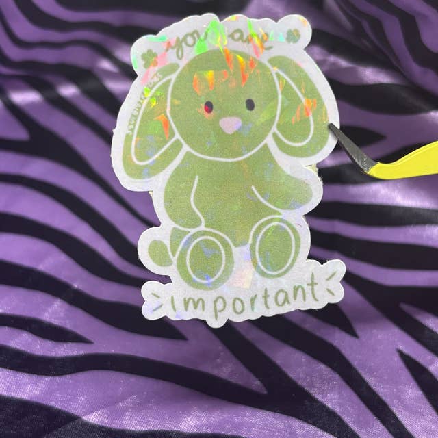green positivity bunny sticker for wholesale by squiglysketches