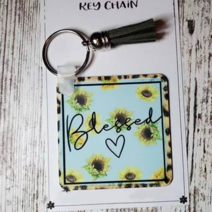 Porte-clés tournesol bienheureux pour la vente par The Sweet T Boutique