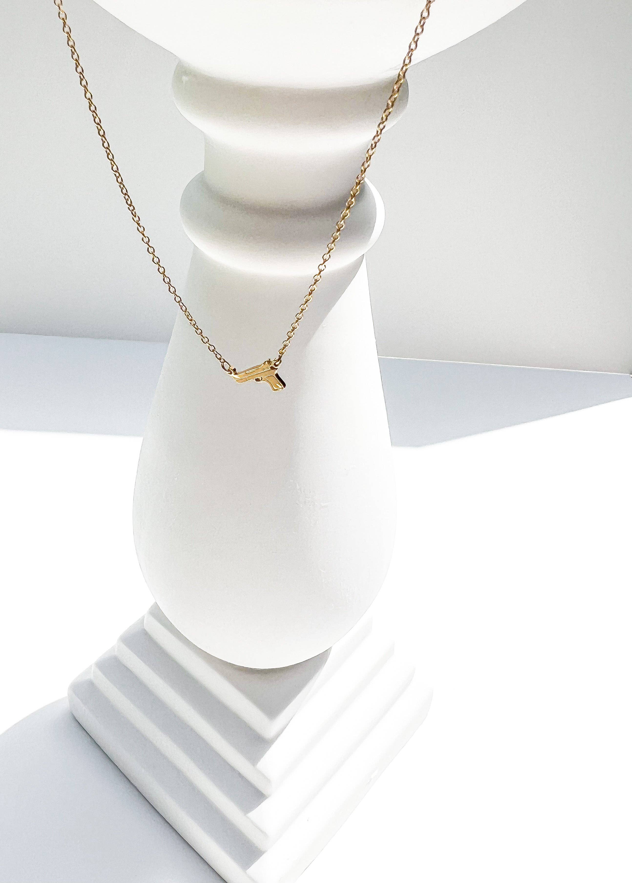 Armed In Style - Wholesale Pendant/Charm Necklace - Tiny Gun Necklace1