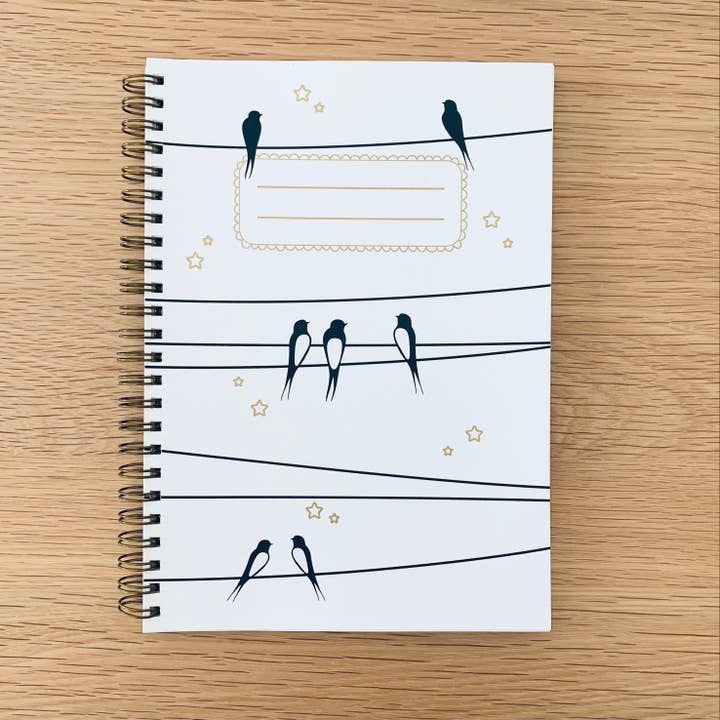 Spiral notebook - Swallows on the wire - White sky for wholesale by Les Petites Hirondelles
