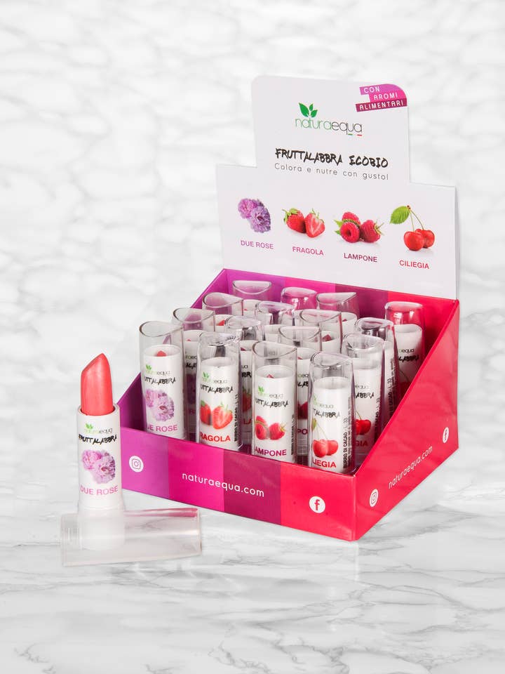 Display of 16 colored lip balms for wholesale by NaturaEqua