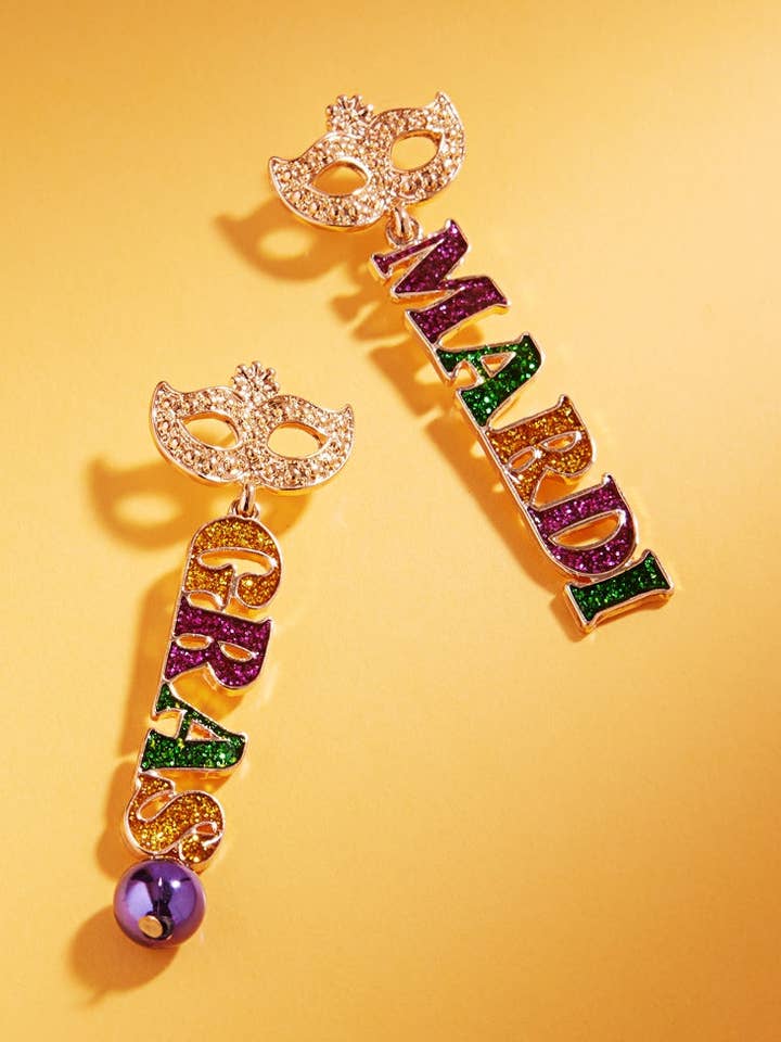 Boucles d'oreilles en titane avec masque de Mardi Gras pour la vente par Designature New York