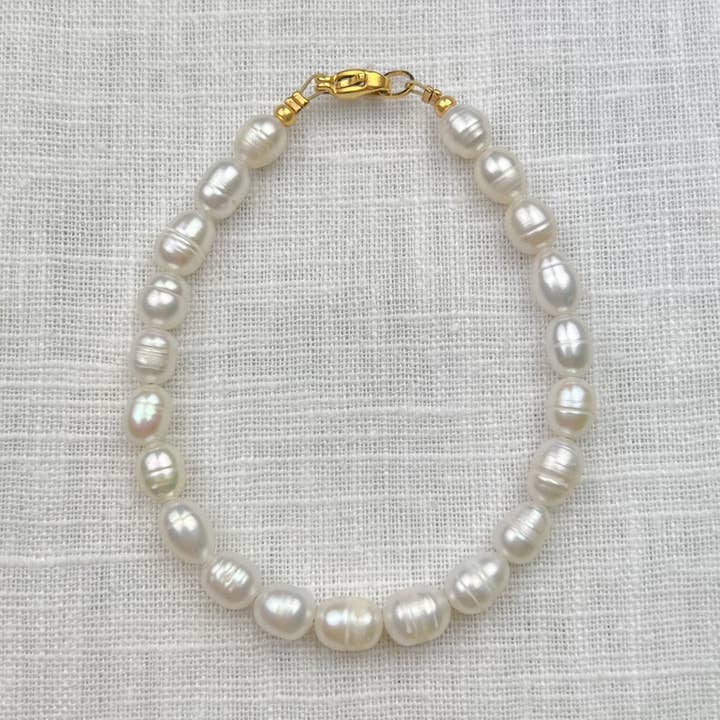 Udsagnet perle for engroshandel hos UNWIND Jewelry