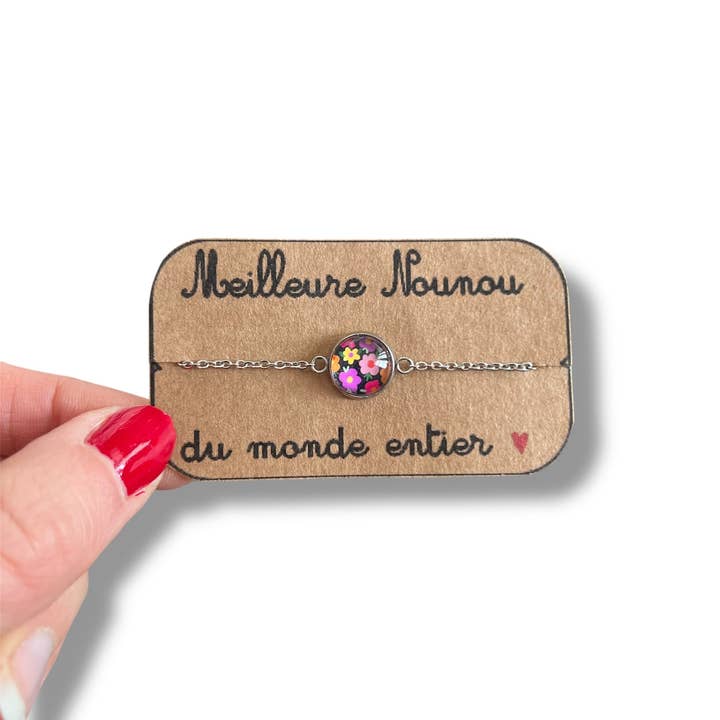 Stainless steel nanny bracelet — multicolored flowers on a black background for wholesale by Dans l'Air du Temps Bijoux