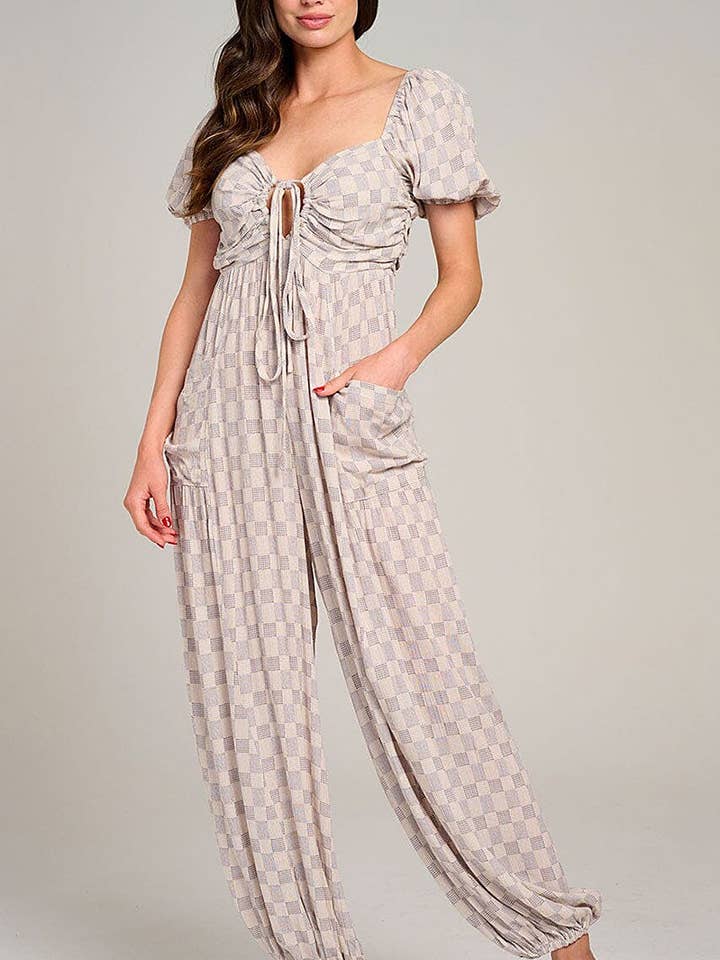 PUFF SLEEVE FRONT POCKETS JOGGER JUMPSUIT and other Purchase Wholesale bell bottom jumpsuit. Free Returns & Net 60 Terms on Faire trending on Faire.