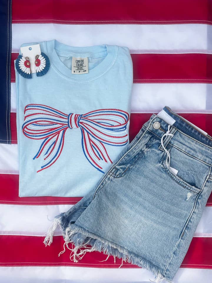 Red White and Blue Embroidered Bow Comfort Color Tee for wholesale by Lakely Claire Wholesale