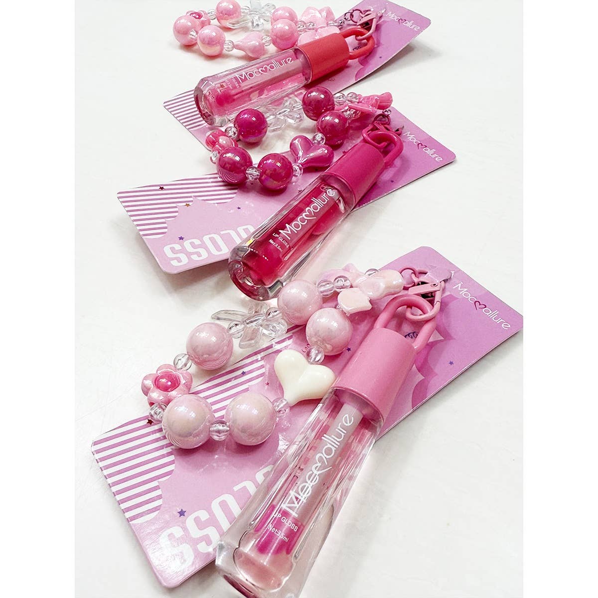 ROSE MULTI Porte-clés Charme Nœud Mignon avec Ensemble de Gloss à Lèvres Parfumé en vente sur Faire4