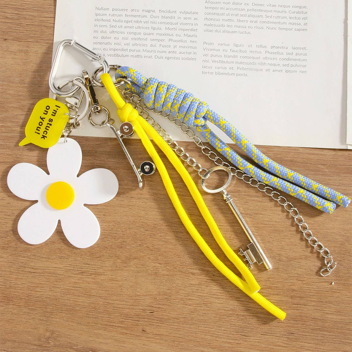 White Mini Skateboard Keychain with Daisy & Letter Charm_CWMM7551 for wholesale on Faire2