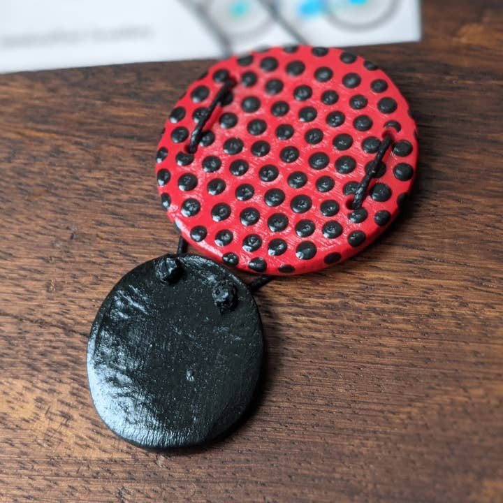 Polka dot necklace black & red, spotty clay necklace for wholesale by With Clay & Paint