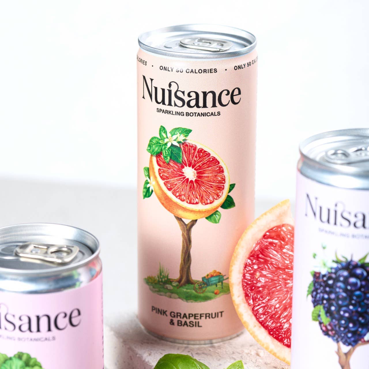 Nuisance Drinks – wholesale Soda/carbonated drink – Pink Grapefruit & Basil | Botanical Soft drinks: Zesty2