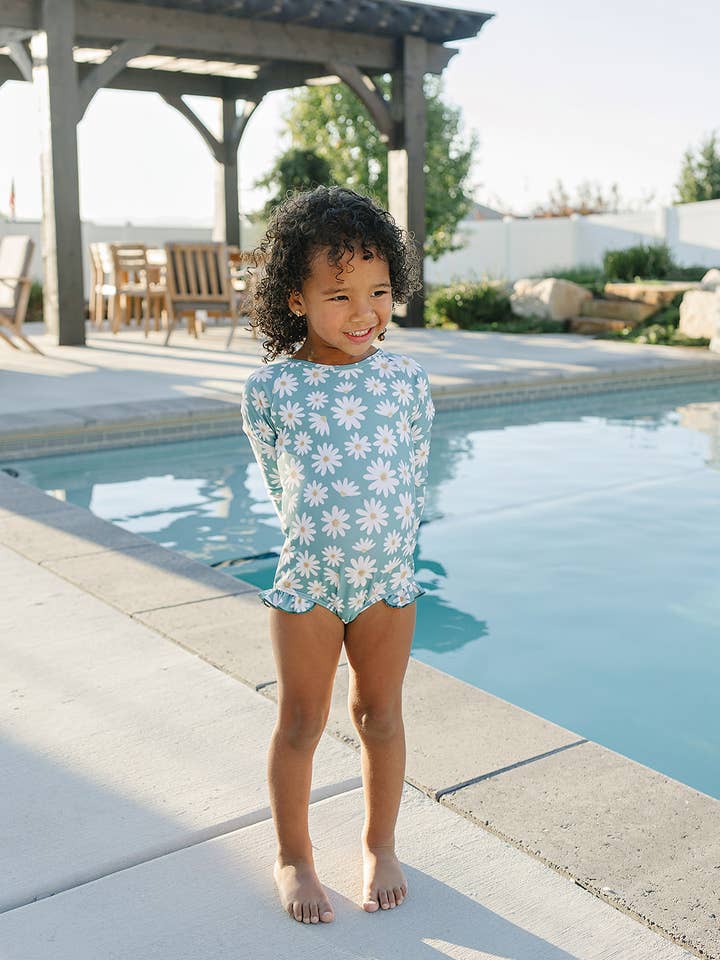 The "Chloe" Ruffle Rashguard Suit for wholesale by Current Tyed Clothing