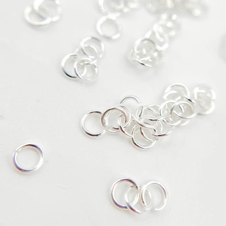 MFT050DE3. Anneau de jonction ouvert en argent sterling blanc de 3 mm, calibre 24. pour la vente par Tresor Jewelry Inc.