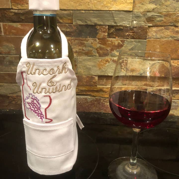 Wine Bottle Apron- Uncork & Unwind for wholesale by All Aboard Party Headquarters
