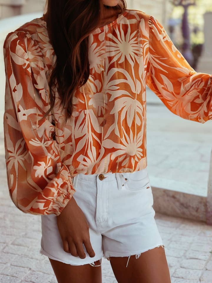 Orange Floral Print Knotted Open Back Long Sleeve Blouse for wholesale on Faire1