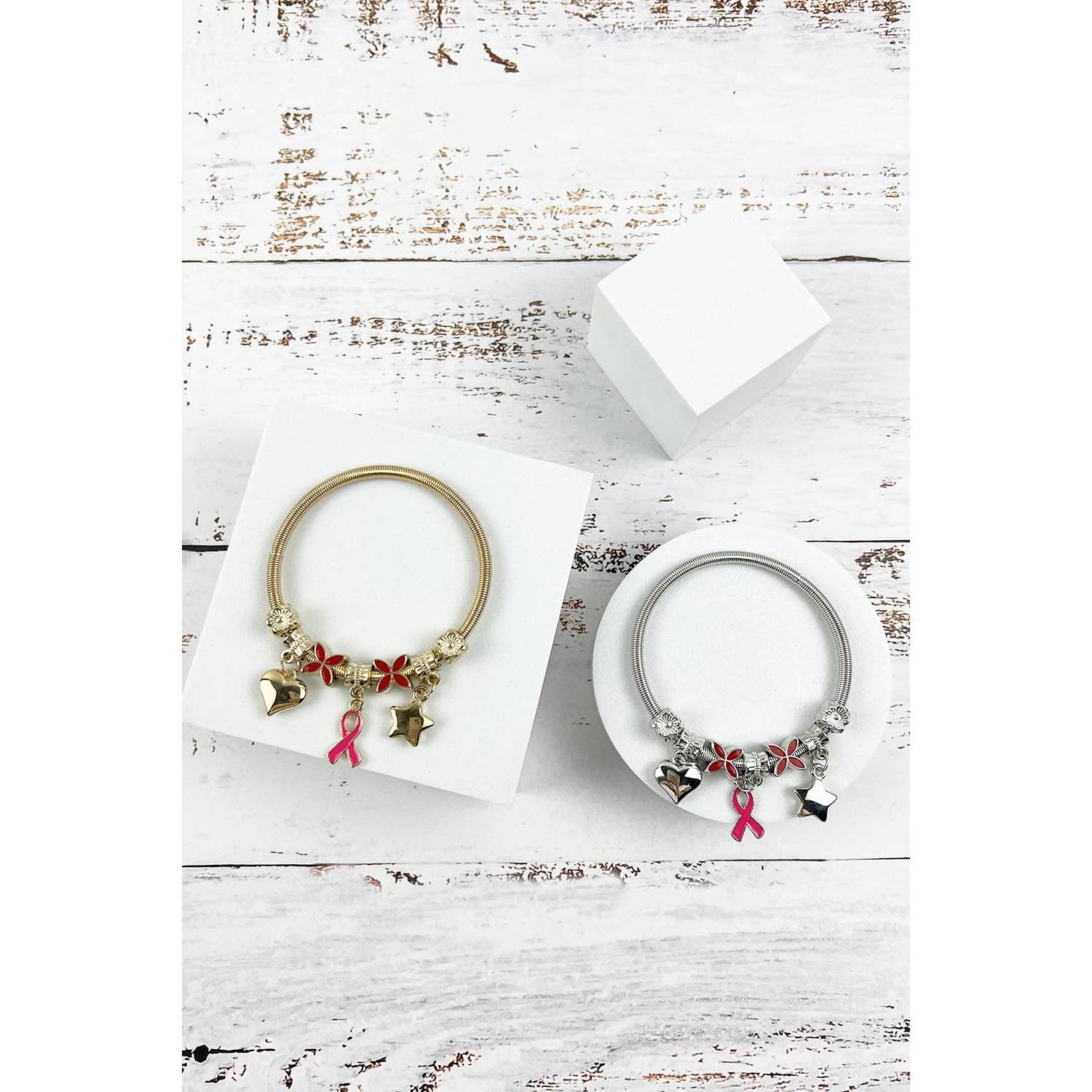 ASSORTED BREAST CANCER AWARENESS PINK RIBBON CHARM BANGLE BRACELET for wholesale on Faire0