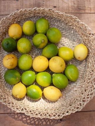 Fruit basket with lace edge, Moroccan Fruit Straw Tray for wholesale by Mikwi