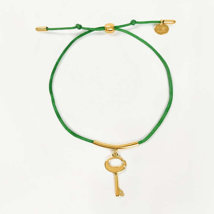 Key String Bracelet (Emerald) - Gold for wholesale by Fortune & Frame