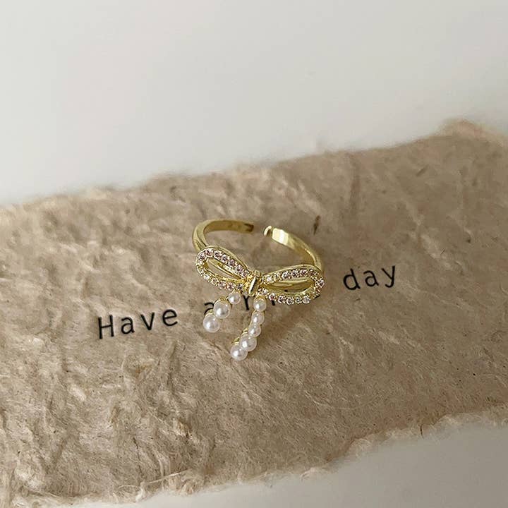 ACCITY - Wholesale Band/Stacked Ring - FASHIONABLE BOW SMALL PEARL RING FOR WOMEN_CWAJE3096