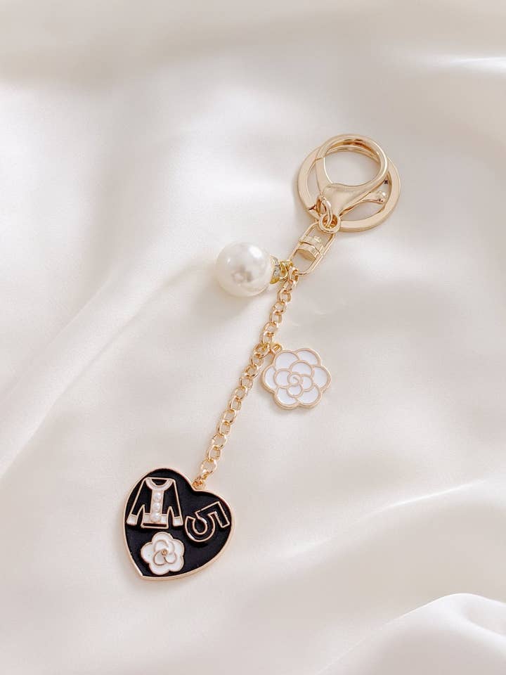 Coco de l'Amour Ikoniske Taske Charme I Sort for engroshandel hos Ziaziari