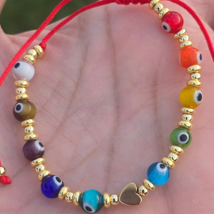 Hilo Rojo ojo turco de colores y protección evil eyes colorfully bracelets lucky bracelets and other Purchase Wholesale red string bracelet. Free Returns & Net 60 Terms on Faire trending on Faire.
