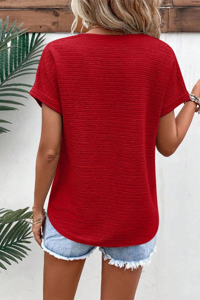 UNISHE - Venta al por mayor Jersey corto de punto - Mujer - Top de manga corta con cuello en V con textura lisa ZK15893