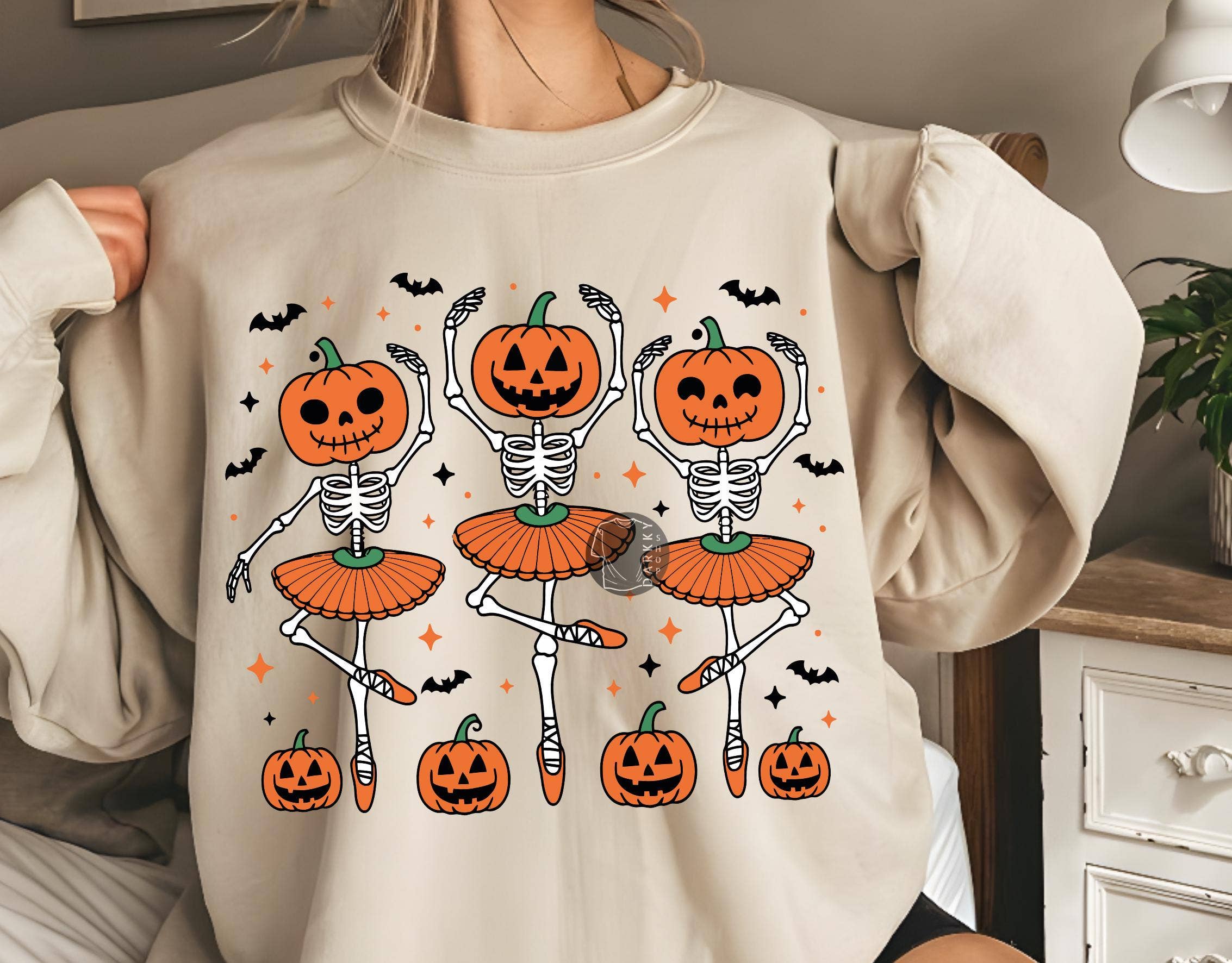NVC Ecommerce LLC - Wholesale T-Shirt (Graphic) - Women's - Ballet Dancing Skeleton Tee, Halloween Pumpkin Sweater1