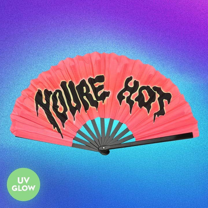 Éventail pliant de danse en ligne avec message "TU ES CHAUD" imprimé en dégradé fluorescent UV lumineux pour la vente par Sensibling Corp.
