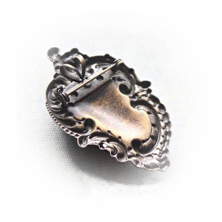 Circa 1890 - Wholesale Brooch - Large Art Nouveau Black & Ivory Cherub Cameo Brooch/Pendant