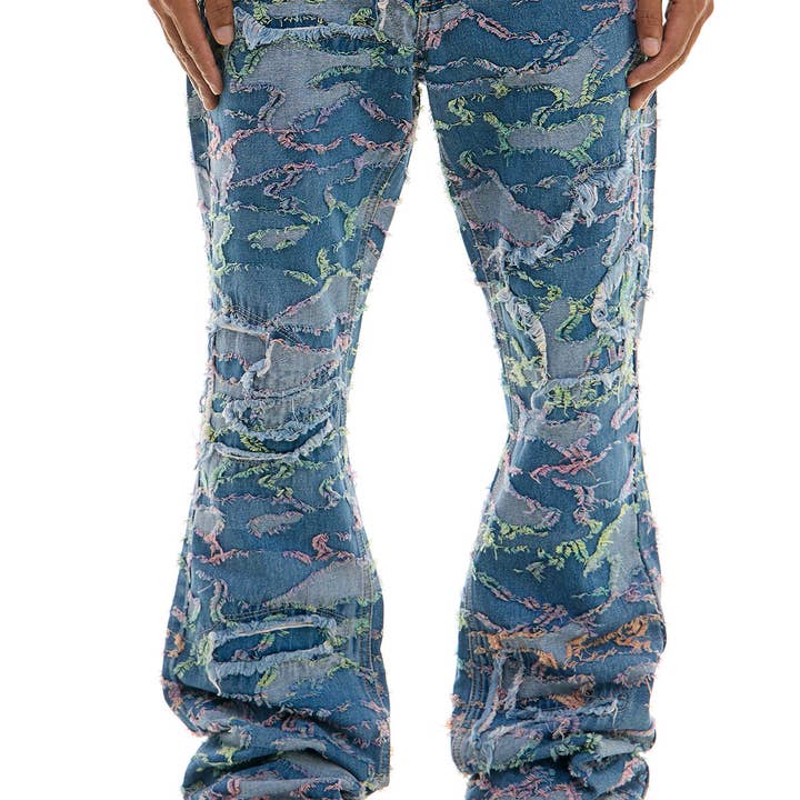 CALÇAS DE GANGA RASGADAS COM ESTAMPA CAMO por atacado de KDNK