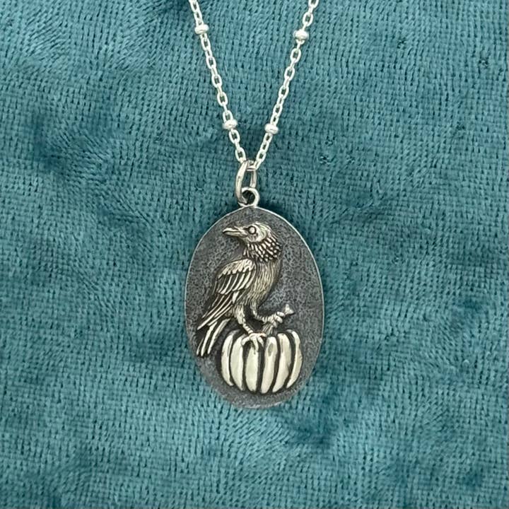 Silver raven on pumpkin Pendant necklace for wholesale by Elizabeth Jewelry